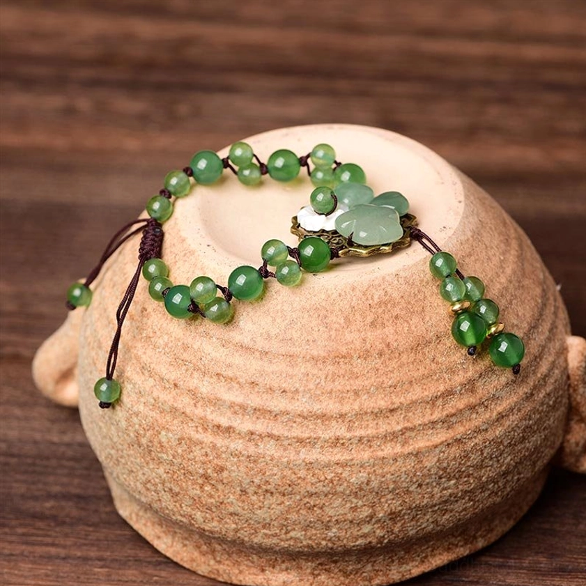 Green jade flower bracelet for protection and inner peace, wearable Buddhist meditation tool