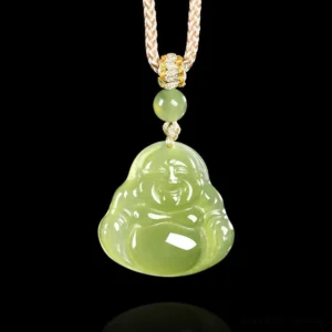 Green jade laughing Buddha pendant necklace front view on black background, showing polished light green jade with braided rope and gold-toned decorative knot