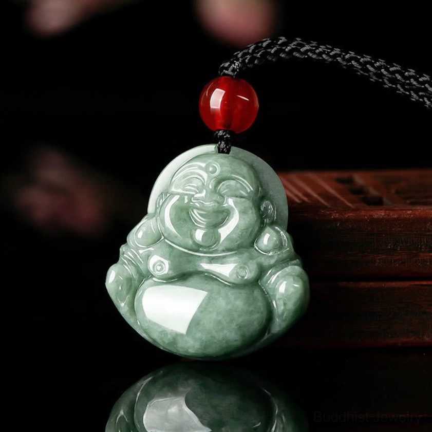 Natural green jade Laughing Buddha pendant necklace front three-quarter view with black braided cord and red accent bead