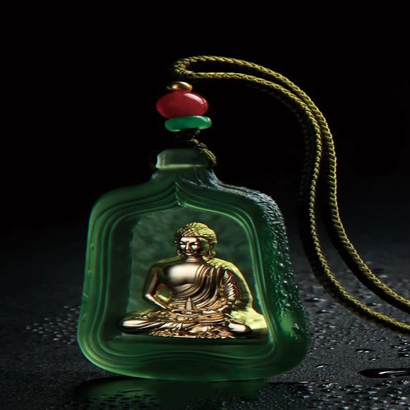 Green Medicine Buddha pendant amulet with olive green braided cord, red-green accent beads, and frosted green glass case - side view