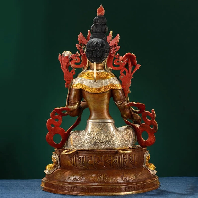 Full rear view of Green Tara Buddha statue with red floral back decorations and bronze-silver mixed materials