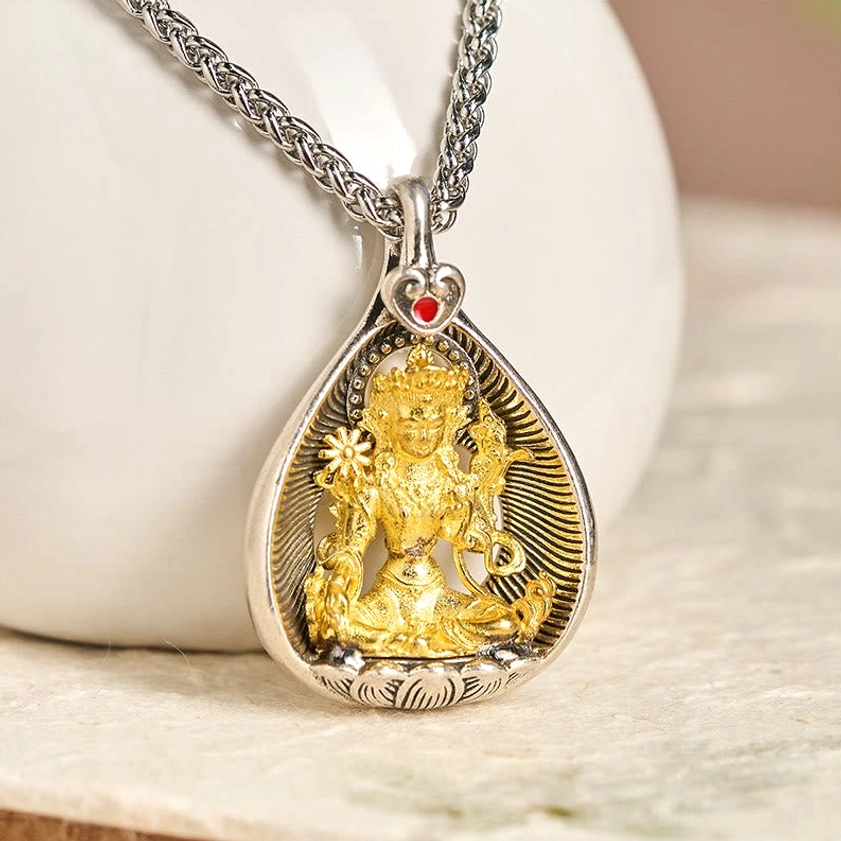 Green Tara Bodhisattva Buddhist necklace pendant front view showing teardrop hollow design with silver curb chain