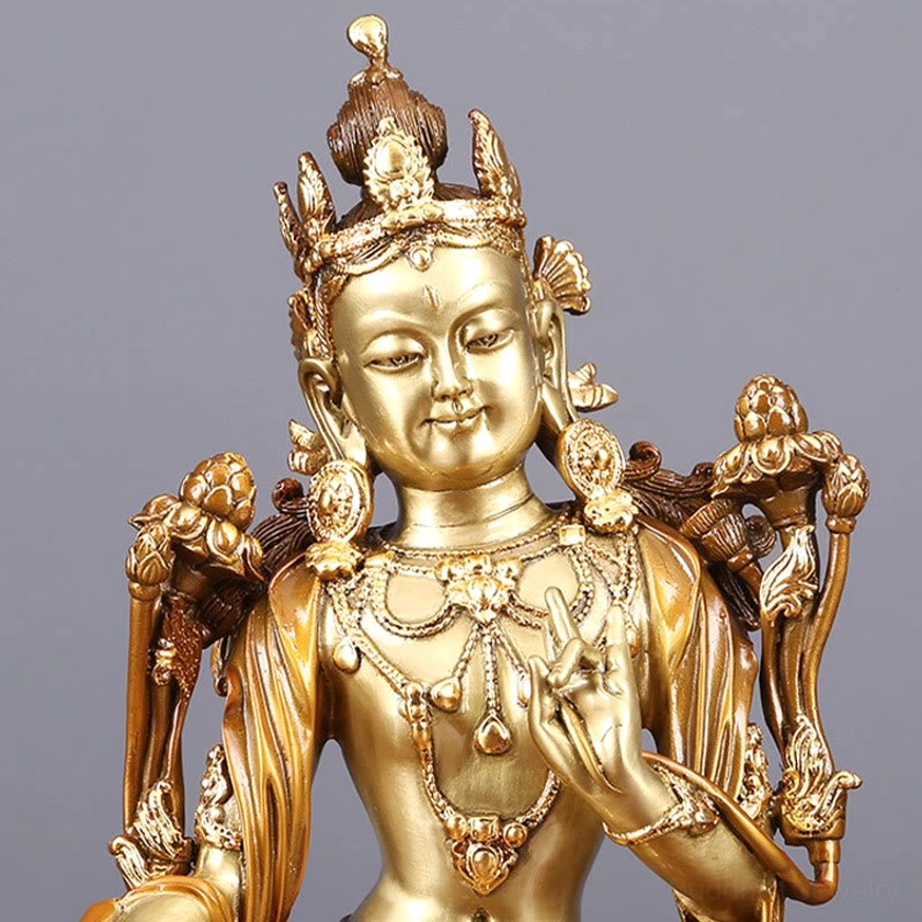 Green Tara upper body close-up - detailed crown, neck jewelry, hand mudra blessing gesture, and floral ornaments