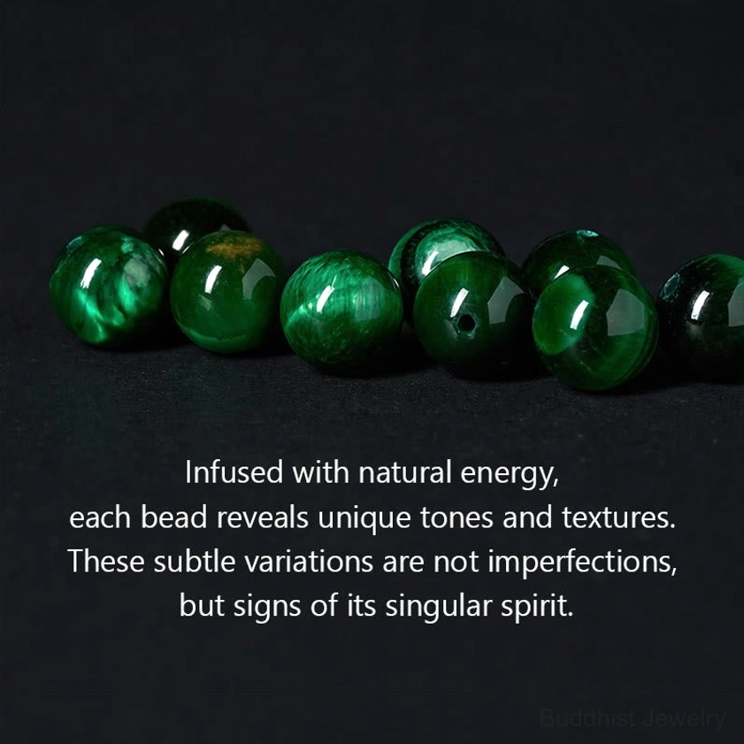 Loose green tiger eye beads showing glossy cat-eye luster and deep green color used in protection bracelets