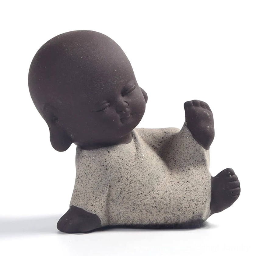 Grey speckled playful reclining monk figurine, handcrafted purple clay peaceful zen decoration