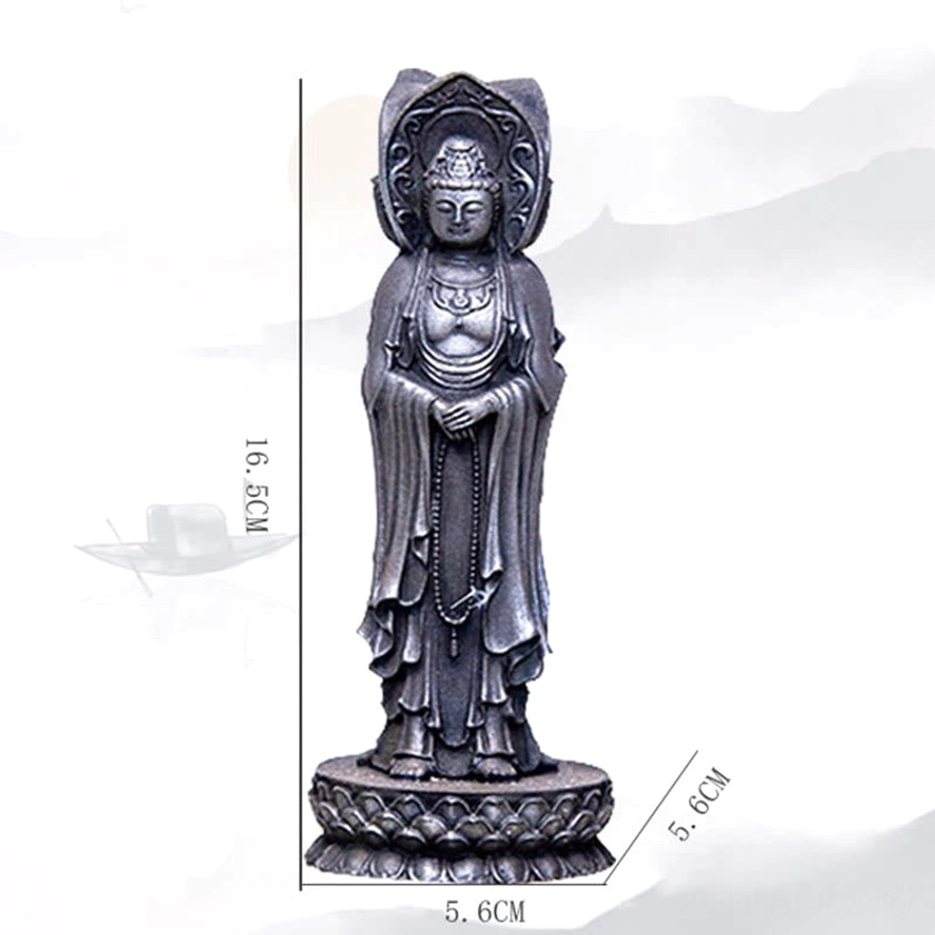 Triple-face Guan Yin statue detailing intricate Buddhist sculpture craftsmanship and symbolism