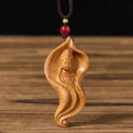 Guanyin Avalokiteshvara lotus leaf wood pendant necklace front view with black braided cord