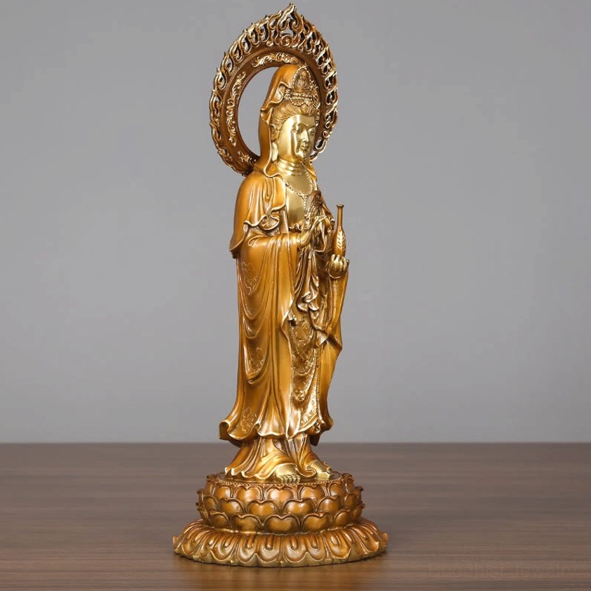 Guanyin statue right side view showing ritual vase and draped robes detail