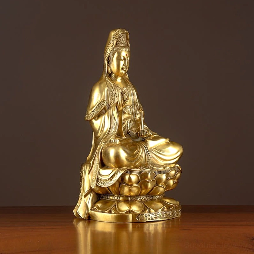 Guanyin Avalokitesvara statue left side profile view, polished golden brass, lotus throne, flowing carved robe details