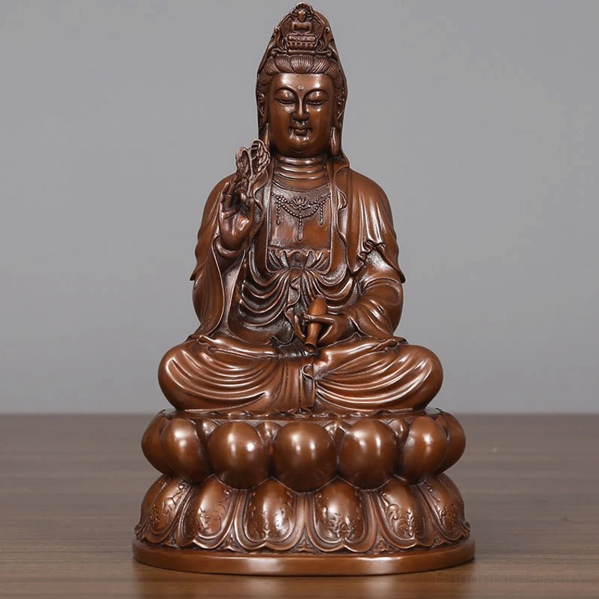 Avalokitesvara Guanyin copper statue front view showcasing embossed lotus pedestal and ornate chest jewelry details