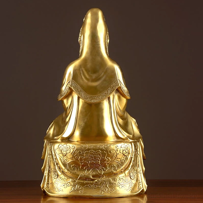 Rear view of brass Guanyin Avalokitesvara statue, glossy golden finish, ornate carved patterns on robe and lotus base