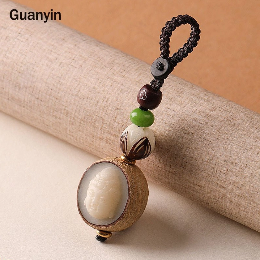 Guanyin Avalokiteshvara bodhi seed keychain with lotus carved bead and dark braided rope