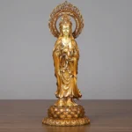 Avalokitesvara Guanyin brass statue full frontal view with flame halo and lotus pedestal