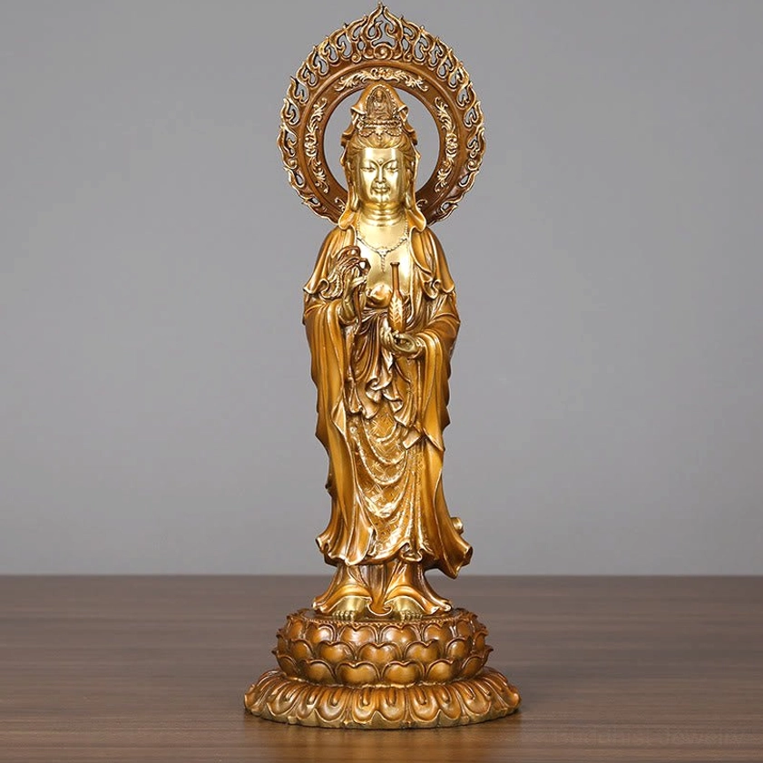 Avalokitesvara Guanyin brass statue full frontal view with flame halo and lotus pedestal