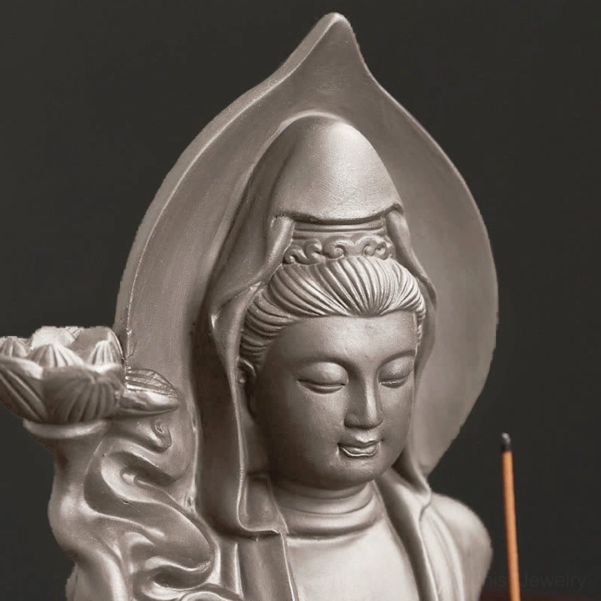 Guanyin Buddha ceramic incense holder close-up portrait - intricately carved face and leaf halo
