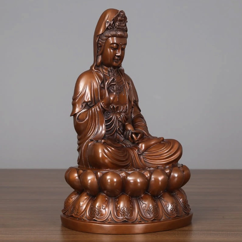 Avalokitesvara Guanyin copper statue left profile view displaying detailed robe folds and graceful proportions