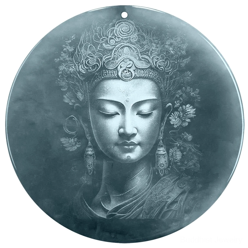 Close-up detail of intricate Guanyin carved face and headdress on jade pendant