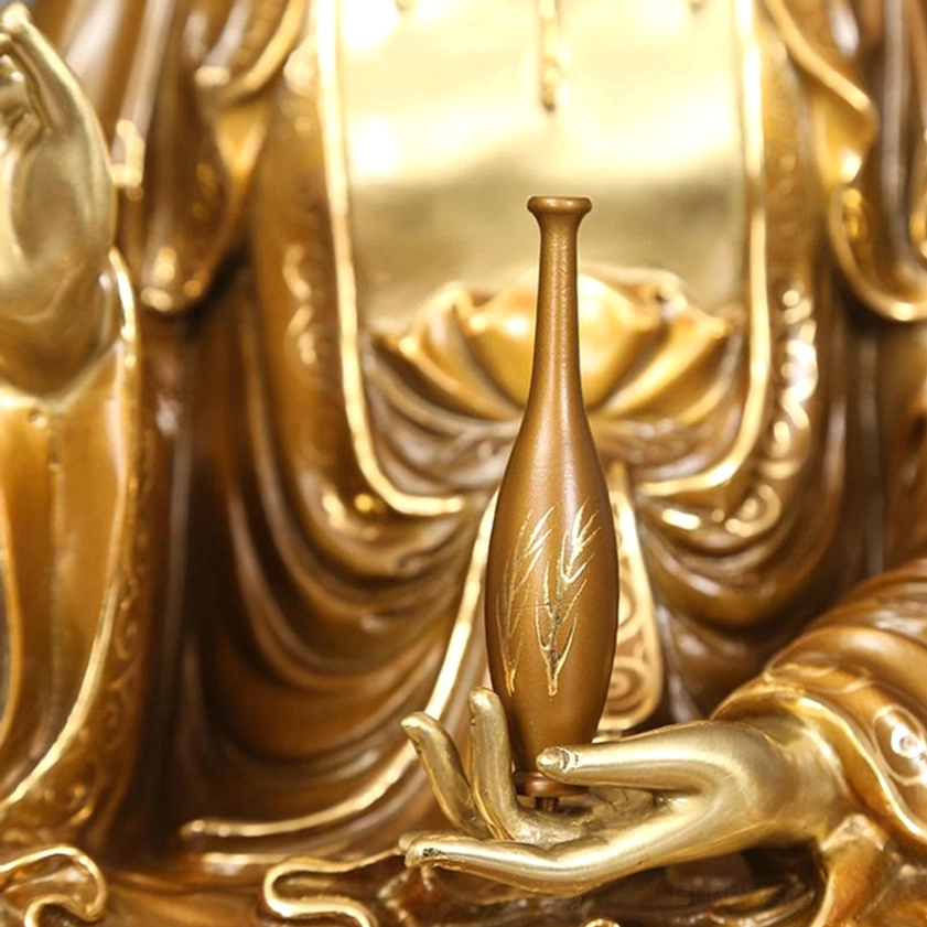 Guanyin left hand holy vase healing water sacred vessel close-up view