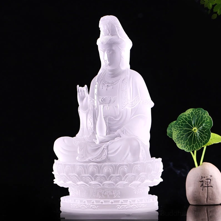 Left side view of pure white frosted Avalokitesvara Guanyin Liuli statue with zen meditation decor