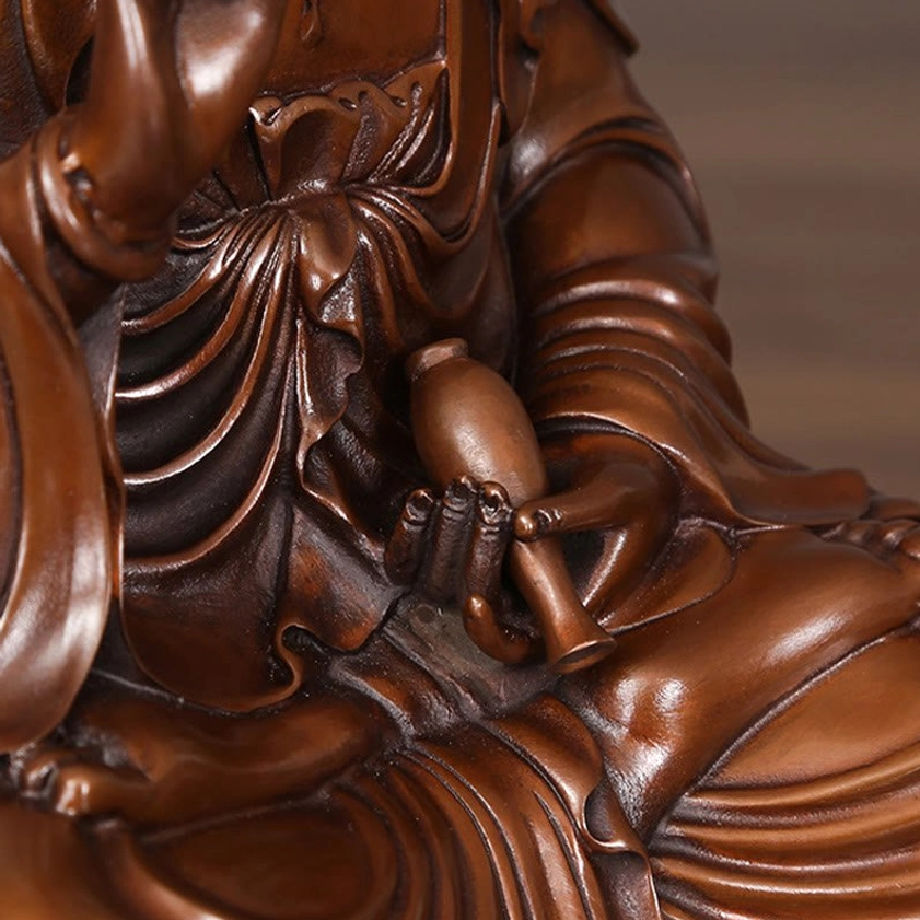 Avalokitesvara Guanyin copper statue chest jewelry and decorative ornaments close-up showcasing hand-carved details