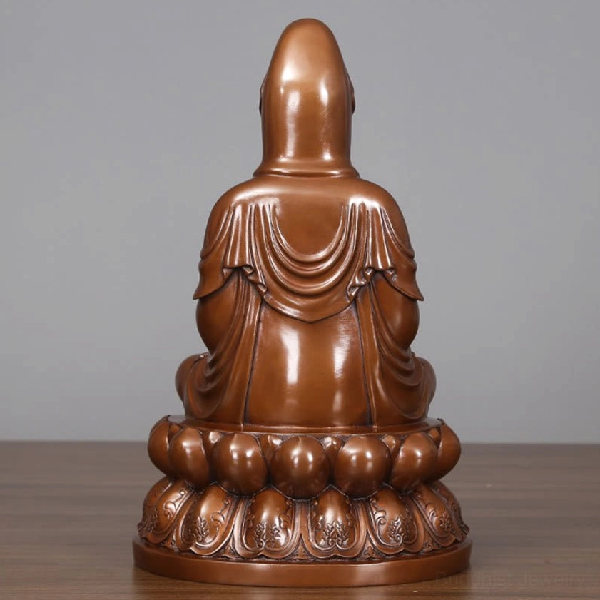 Avalokitesvara Guanyin copper statue rear view showing smooth back robe draping and unified bronze tone craftsmanship