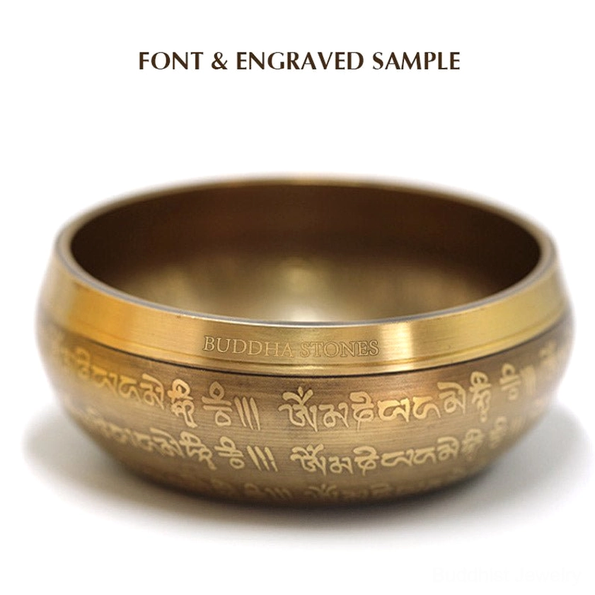 Hand-forged brass singing bowl with intricate sacred Buddhist symbols perfect for yoga studios, spiritual centers, and wellness practices