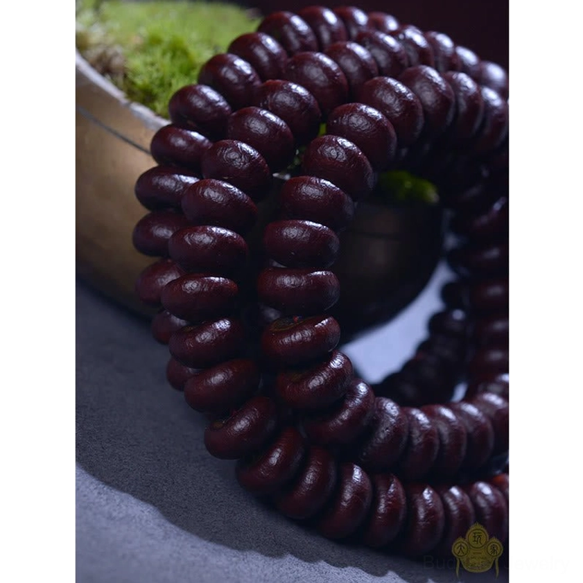 Authentic hand-knotted 108 bodhi seed mala with traditional red tassel for yoga and mindfulness