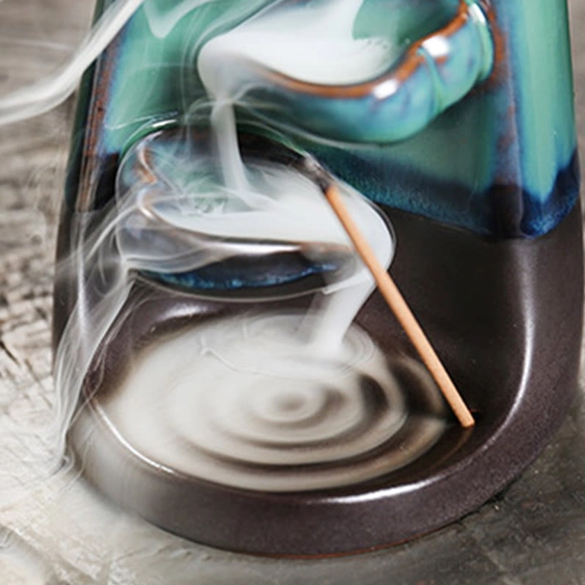 Romantic couple embrace incense burner with turquoise ceramic and hand-painted details