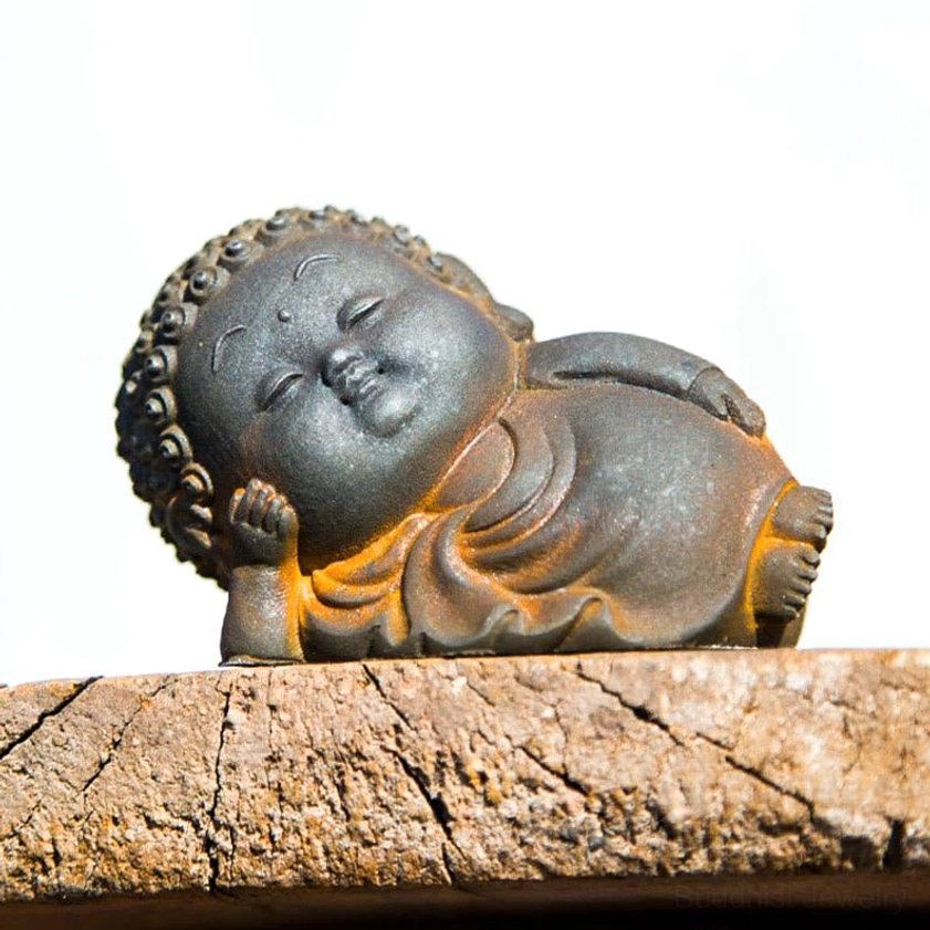 Buddha figurine hand-poured iron powder resin showing authentic rustic gray finish with brown edges