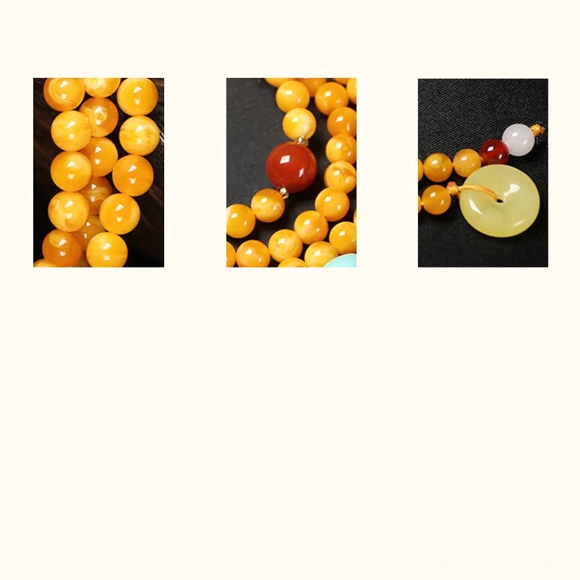 Handcrafted 108 bead amber mala necklace with turquoise guru bead, peace buckle and gold charm for spiritual practice