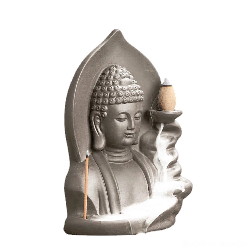 Handcrafted Avalokitesvara Buddha incense burner with lotus design and flowing smoke