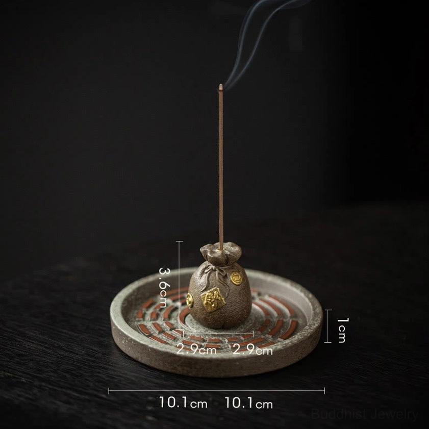 Handcrafted ceramic Bagua incense burner showing intricate engraving and natural material authenticity