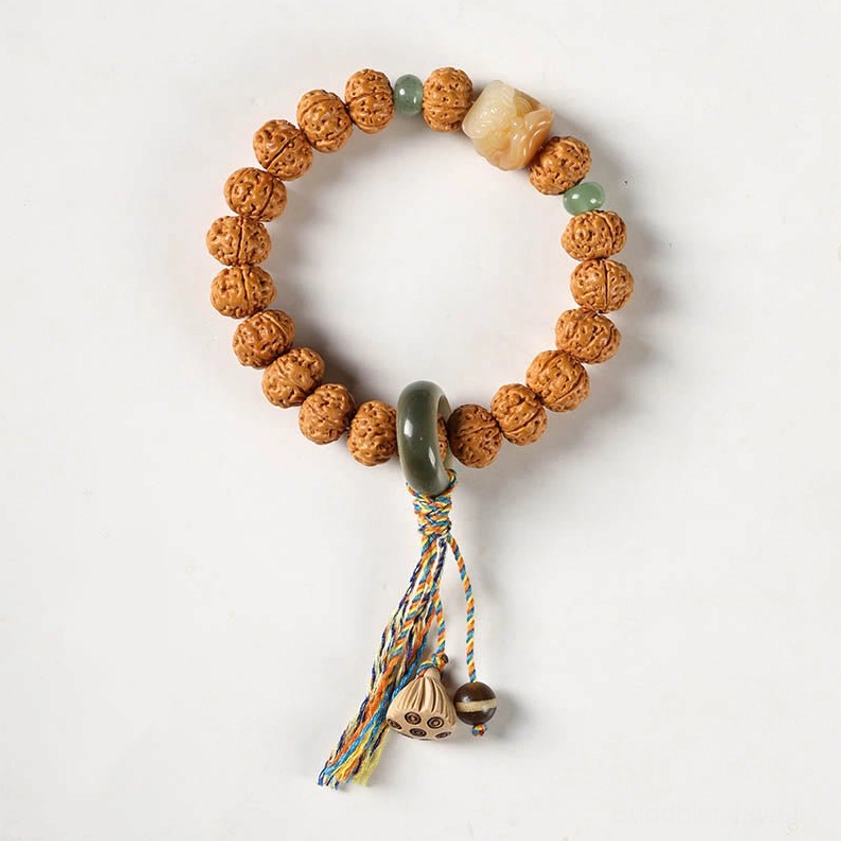 Handcrafted bodhi seed prayer bracelet featuring three-eye Dzi bead and Buddha hand spiritual charm