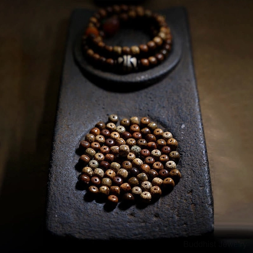 Handcrafted bodhi seed bracelet with amber dzi agate beads for spiritual practitioners and conscious living enthusiasts