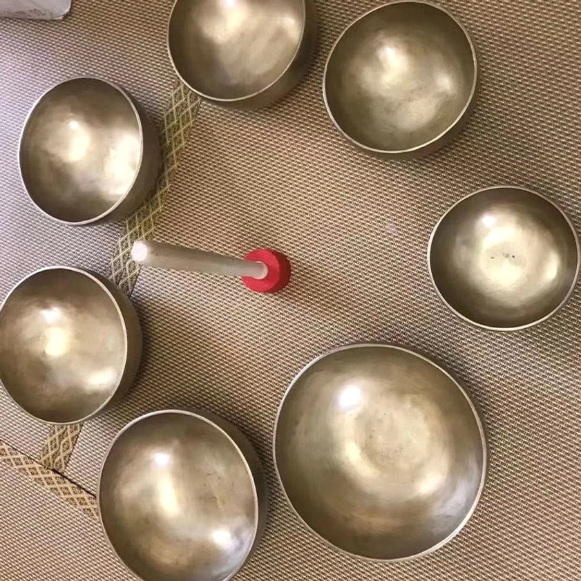 Handcrafted brass singing bowl with felt cushion for safe storage and display