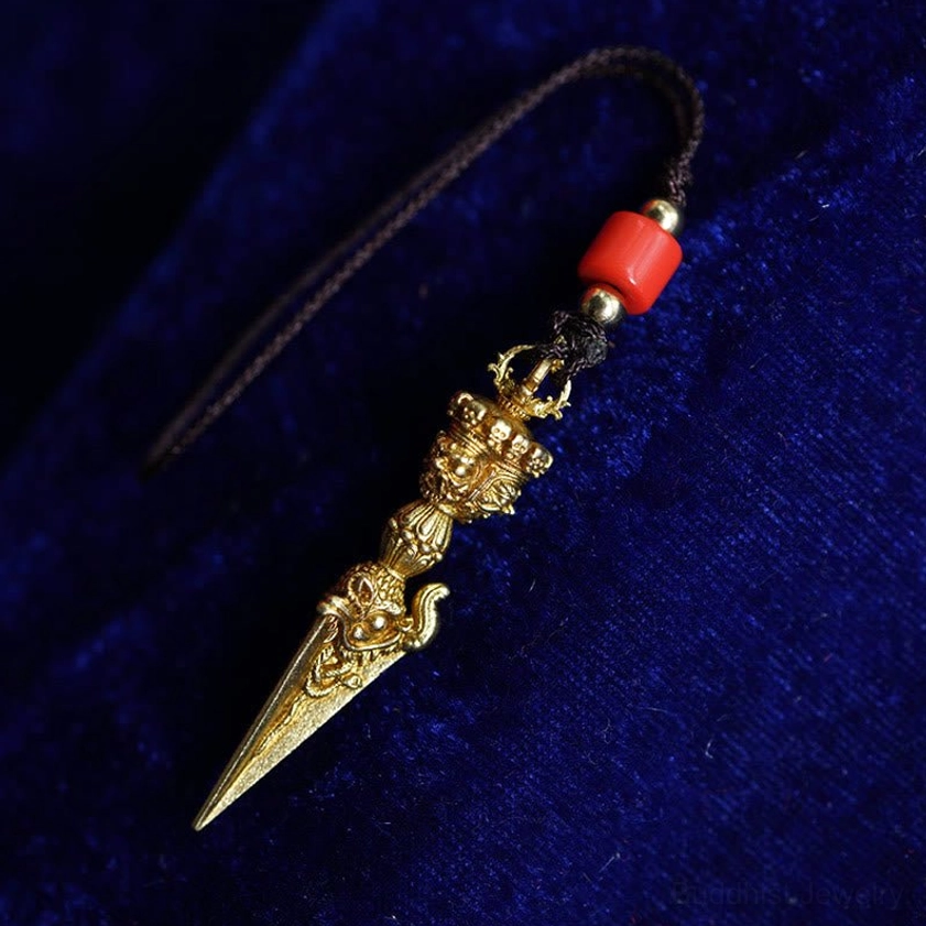 Handcrafted brass vajra dorje spiritual pendant showing intricate Buddhist engravings