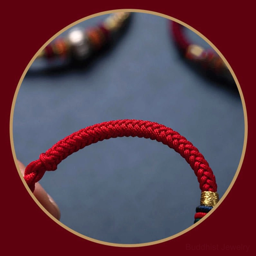 Handcrafted Buddhist braided bracelet with premium rope construction and silver Om Mani Padme Hum charm for protection and luck