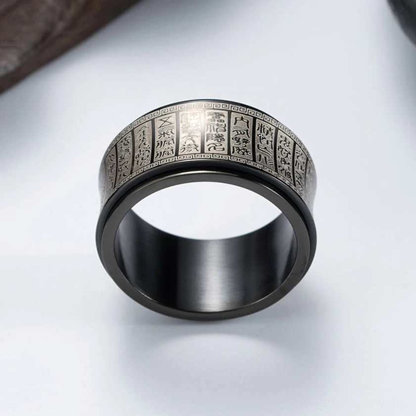 Handcrafted titanium steel Buddhist mantra ring showing fine engraving quality