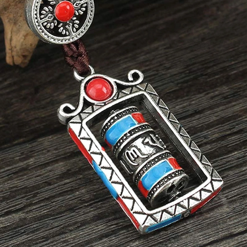 Handcrafted Buddhist prayer wheel keychain with rotatable cylinder for daily spiritual practice