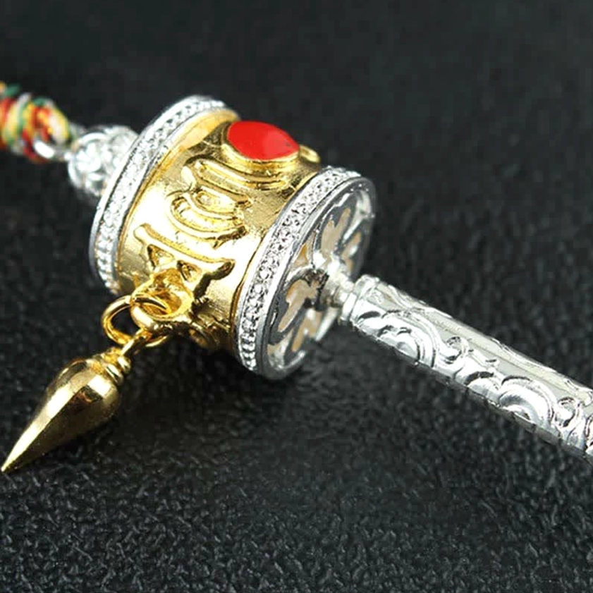 Handcrafted Buddhist prayer wheel with engraved mantra - authentic artisan spiritual jewelry