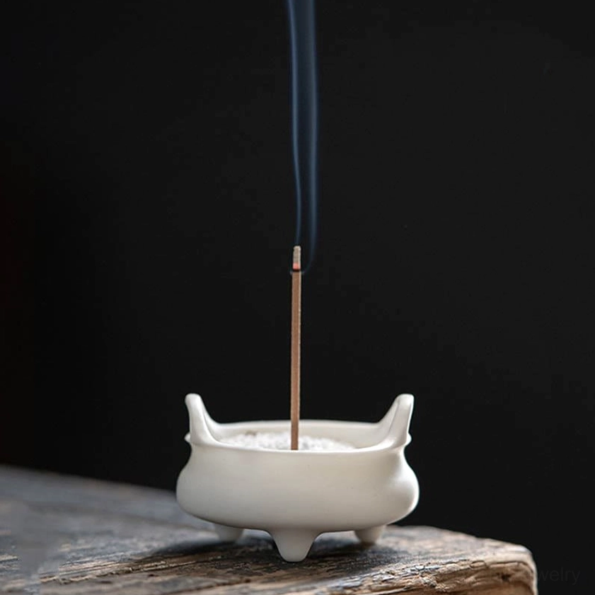 Ceramic incense burner with carved decorative elements, handcrafted for home altar and personal meditation space