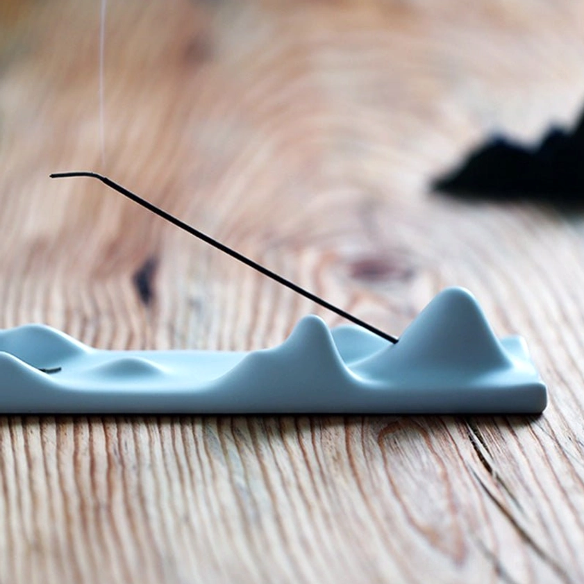 Handcrafted ceramic mountain incense holder showing natural artisanal craftsmanship details