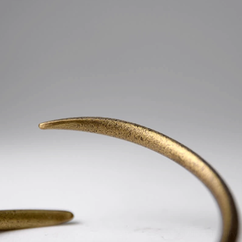 Handcrafted adjustable copper cuff bracelet showing natural material variations and authentic artisanal quality