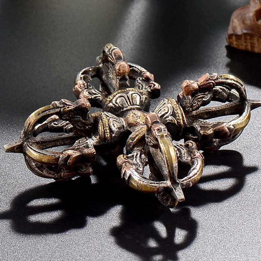 Double dorje vajra Buddhist ritual object - authentic handcrafted thunderbolt symbol for meditation and spiritual practice