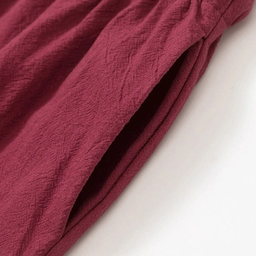 Handcrafted frog button detail on traditional Buddhist meditation garment, men's cotton shirt