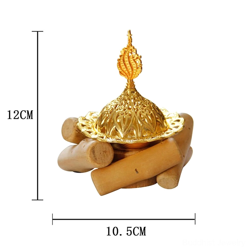 Handcrafted gold Buddhist incense burner highlighting artisan workmanship and hollow carved design - detail shot