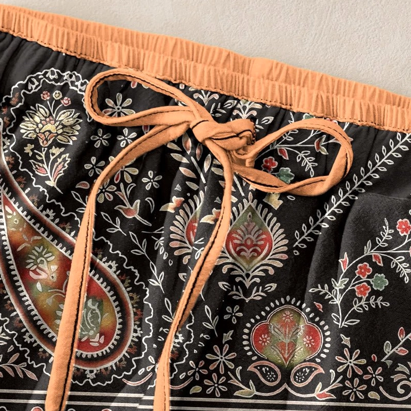 Handcrafted lotus and paisley harem pants for women featuring sustainable cotton and artisanal printing