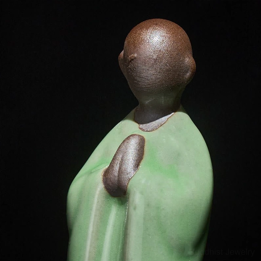 Handcrafted ceramic meditation monk figurine contemplative pose mindfulness