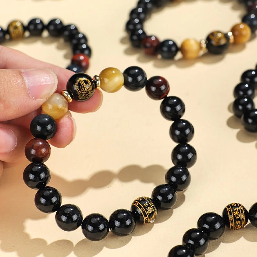 Black onyx tiger eye gemstone Buddhist bracelet handcrafted natural stone authenticity display