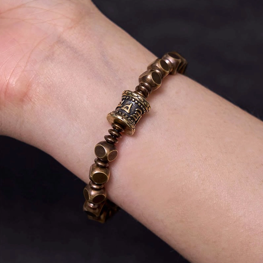Authentic handcrafted Om Mani Padme Hum bracelet showing traditional Buddhist artisan quality